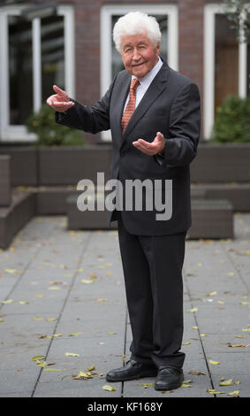 Stuttgart, Germany. 24th Oct, 2017. Choir director Gotthilf Fischer standing at a terrace in Stuttgart, Germany, 24 October 2017. For 7 decades Gotthilf Fischer has been bringing choir music to Germany's turntables. His music label awarded the composer and director of the Fischer Choir with a golden record for '70 years of recording'. Credit: Marijan Murat/dpa/Alamy Live News Stock Photo