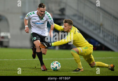 Furth, Germany. 24th Oct, 2017. Furth's David Raum (L) plays against Ingolstadt's goalkeeper Orjan Nyland during the DFB Cup soccer match between SpVgg Greuther Furth and FC Ingolstadt 04 in the Ronhof Sport Park in Furth, Germany, 24 October 2017. Credit: Timm Schamberger/dpa/Alamy Live News Stock Photo