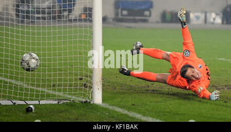 Magdeburg, Germany. 24th Oct, 2017. Magdeburg's goalkeeper Alexander Brunst fails to save the 3-0 penalty score during the DFB Cup soccer match between 1. FC Magdeburg and Borussia Dortmund in the MDCC Arena in Magdeburg, Germany, 24 October 2017. Credit: Hendrik Schmidt/dpa-Zentralbild/dpa/Alamy Live News Stock Photo