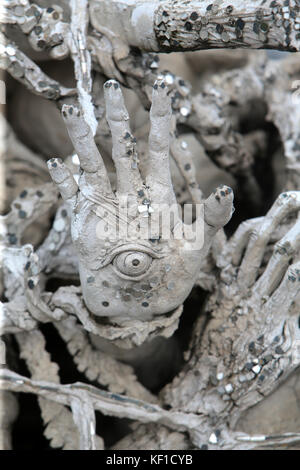 Chiang Rai, Thaliand. 25th Oct, 2017. Preparations are under way to celebrate the royal cremation ceremony of His Majesty the King Bhumibol Adulyadej. Wat Rong Khunor better known as the White Temple uses pieces of glass in the plaster, sparkling in the sun. The white color signifies the purity of the Buddha, while the glass symbolises the Buddha’s wisdom and the Dhamma, the Buddhist teachings. Credit: Paul Quezada-Neiman/Alamy Live News Stock Photo