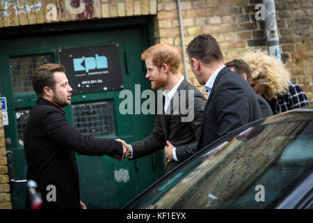 Copenhagen, Denmark. 25th October, 2017.HRH Prince Harry of Wales shakes hands with Olivier Sevestre – community manager of KPH Projects in Copenhagen. Harry paid a visit to the centre during a two-day official trip to the Danish capital. Credit: Matthew James Harrison / Alamy Live News Stock Photo