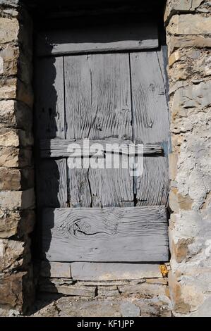 Rustic grey door, Connio, Carrega Ligure, Piedmont, Italy. Stock Photo