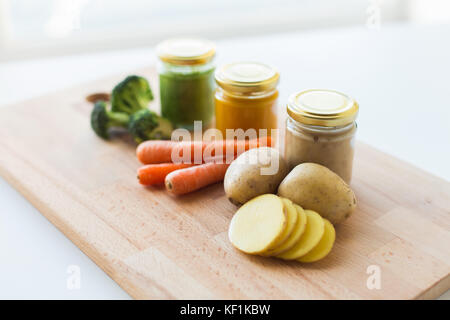 vegetable puree or baby food in glass jars Stock Photo