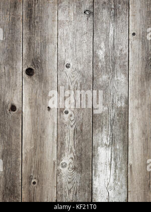 Rustic silver grey weathered barn wood board background showing rich grain and knots Stock Photo