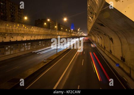 A long exposure of cars travelling up and down Gran Via de les Corts Catalanes in Barcelona at night. Stock Photo
