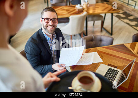 Financial Manager Working from Cafe Stock Photo