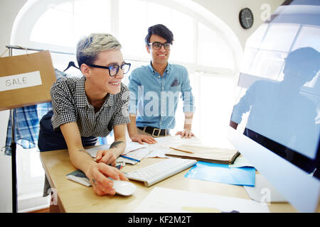 Working in fashion-studio Stock Photo