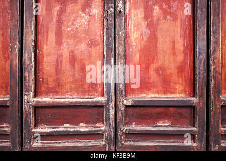 Close up picture of an old wooden door, color toning applied. Stock Photo