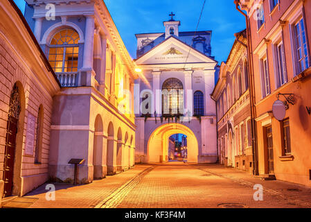Vilnius, Lithuania: the Gate of Dawn, Lithuanian Ausros, Medininku vartai, Polish Ostra Brama  in the sunrise Stock Photo