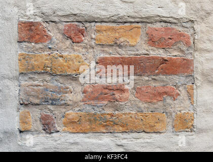 Banner of old vintage bricks as an element of plastered wall Stock Photo