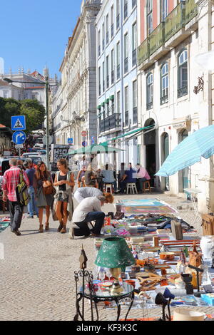 Traders offer all kind of goods at the popular Market of the Thieves in Lisbon Portugal Stock Photo