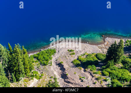 Deep blue water in the huge caldera of the Crater lake National Park, Oregon, USA Stock Photo