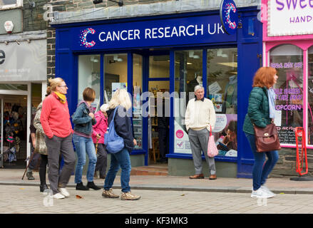 Cancer Research UK charity shop store shopfront exterior Keswick Cumbria England UK United Kingdom GB Great Britain Stock Photo