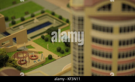 Miniature model,miniature building,city. Model Towns. Miniature model, miniature toy buildings, cars and people. City maquette. Layout Stock Photo