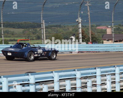 Chevrolet Corvette Gran-sport racer on track at Watkins Glen, NY, competing in historic vintage races. Stock Photo