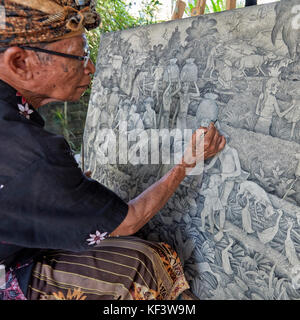 Artist working at the Agung Rai Museum of Art (ARMA). Ubud, Bali, Indonesia. Stock Photo