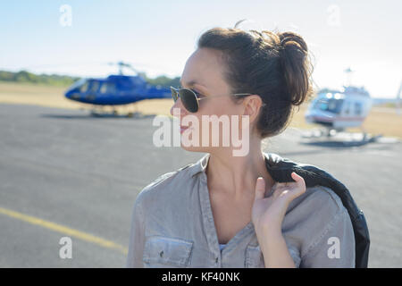 young woman helicopter pilot Stock Photo