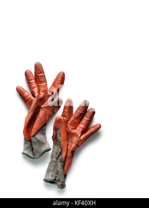 Dirty worn orange rubber coated work gloves on white Stock Photo