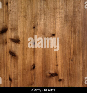 Rustic warm brown wood board background with knots and grain Stock Photo