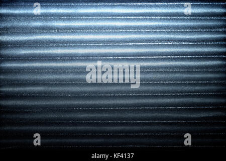 Blue corrugated metallic texture industrial abstract pattern background with ridges gradation Stock Photo