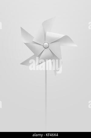 A regular toy pinwheel windmill with white colored vanes on a stick on an isolated background  - 3D render Stock Photo