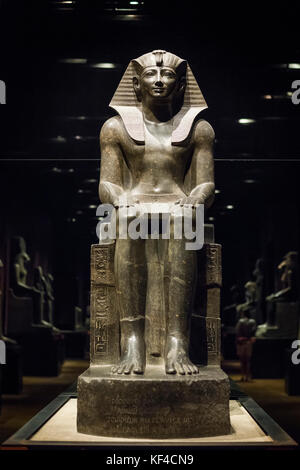 Turin. Italy. Statue of Egyptian Pharaoh Tuthmosis III seated on a throne. New Kingdom, 18th Dynasty (1479-1425 B.C) Museo Egizio (Egyptian Museum).   Stock Photo