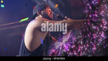 Digital composite of man singing at concert with transition Stock Photo