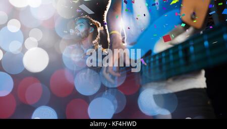Digital composite of guitar at concert with transition Stock Photo