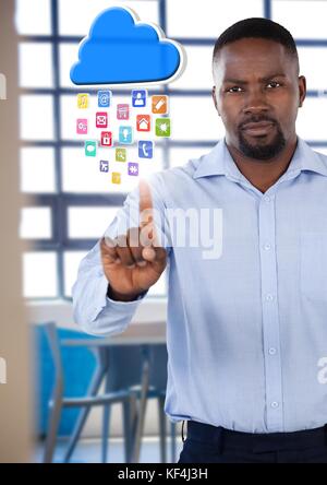 Digital composite of Cloud App icons and Businessman pointing touching air in front of canteen cafeteria Stock Photo