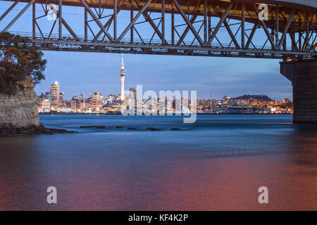 Auckland Skyline and Harbour Bridge at twilight from Northcote Point. Stock Photo