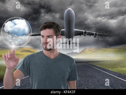 Digital composite of Cloud bubble and Businessman touching air in front of airplane on runway Stock Photo