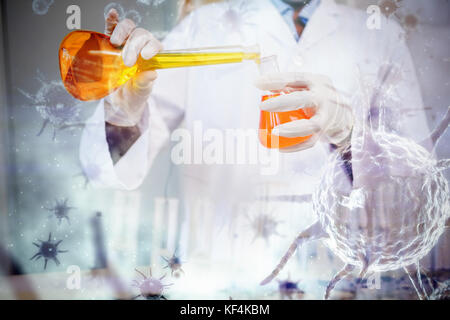 Digital image of blue virus against scientist making chemical Stock Photo