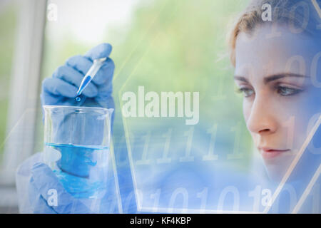Digital image of hexagon shape with binary numbers on screen against scientist making chemical Stock Photo