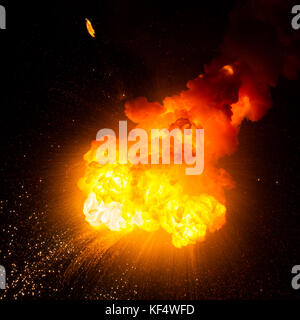 Realistic fire explosion, orange color and sparks isolated on black background. Fire explosion. Texture photography Stock Photo