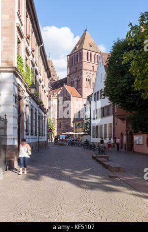 People walk over a bridge in the Petite France quarter of Strasbourg, France Stock Photo