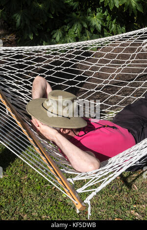 Senior Man Relaxing in Hammock, South Carolina, USA Stock Photo