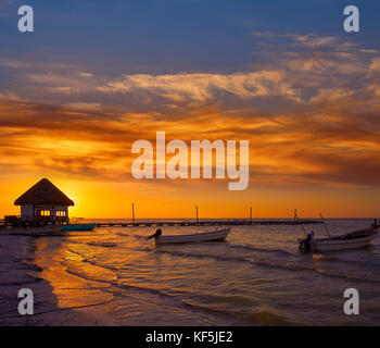 Holbox Island pier palapa sunset beach in Mexico Quintana roo Stock Photo