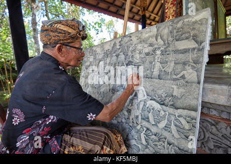 Artist working at the Agung Rai Museum of Art (ARMA). Ubud, Bali, Indonesia. Stock Photo