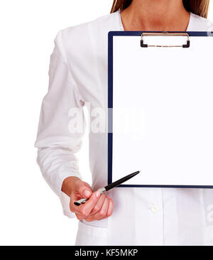 Closeup shot of woman doctor or nurse pointing to a blank copyspace using a pen on the clipboard, isolated on white background Stock Photo