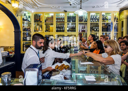 Lisbon Portugal,Belem,historic district,Rua de Belem,Fabrica de Pasteis de Belem,bakery,pastry shop,Portuguese confectionery,local specialty,counter,H Stock Photo