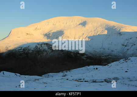 Tromsdalstind Covered In Snow In Autumn Sun Stock Photo