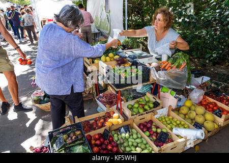 Lisbon Portugal,Bairro Alto,Jardim do Principe Real,park,garden,Mercado Biologico do Principe Real,organic market,vendor vendors,stall stalls booth ma Stock Photo