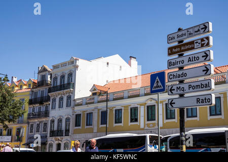 Lisbon Portugal,Bairro Alto,Praca do Principe Real,plaza,square,historic district,residential apartment buildings,street sign,directions,arrows,direct Stock Photo