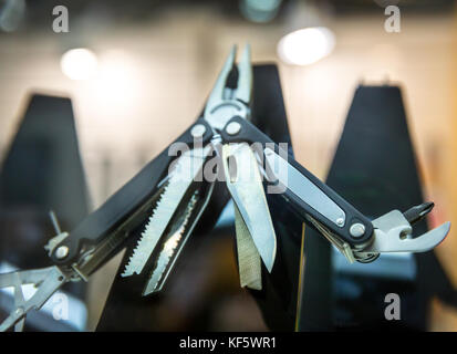 Multipurpose knife, black swiss penknife closeup Stock Photo