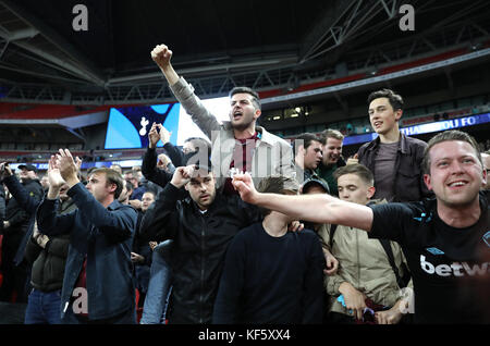 Fans react in the stands during the Carabao Cup, Fourth Round match at Wembley, London. Stock Photo