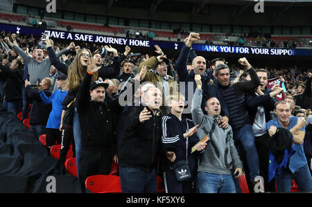 Fans react in the stands during the Carabao Cup, Fourth Round match at Wembley, London. Stock Photo