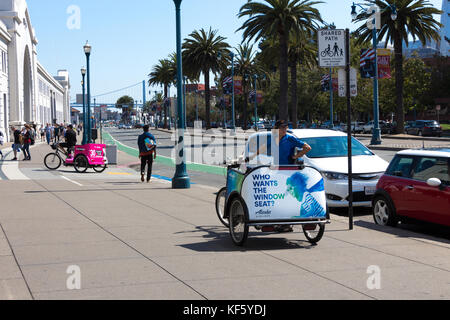 San Francisco, California, USA - September 13th, 2017: A pedicab is waiting for passengers along the pier 35, San Francisco. Stock Photo