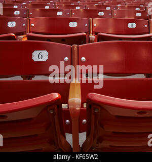 close up of empty red chairs in outdoor theater Stock Photo