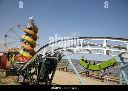 Ferris wheel helter skelter and rollercoaster on Cleethorpes