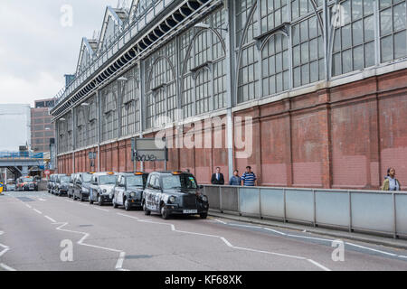 Taxis queuing outside Waterloo station in central London. Stock Photo